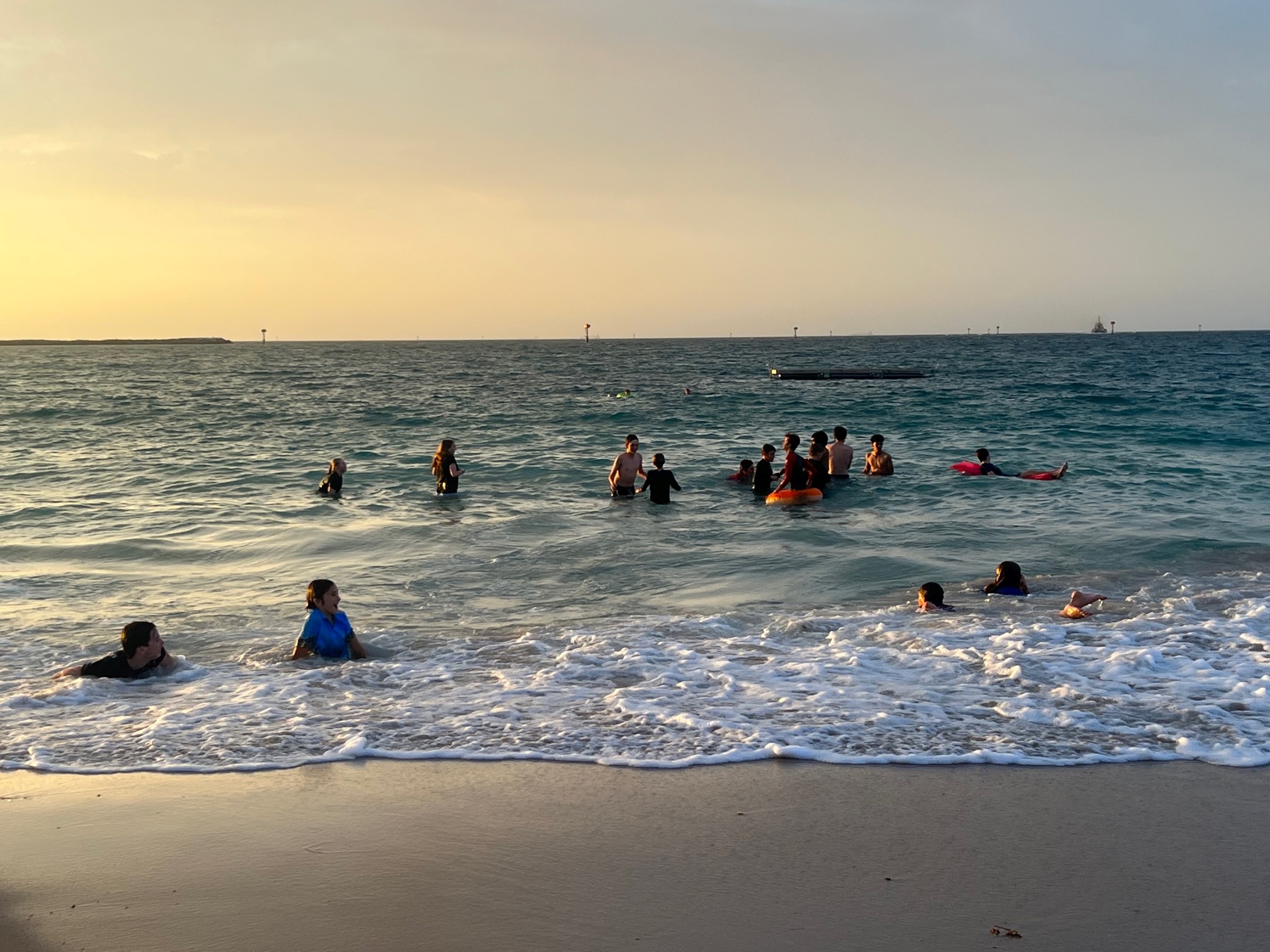 Geraldton Residential College boarders swimming at the beach