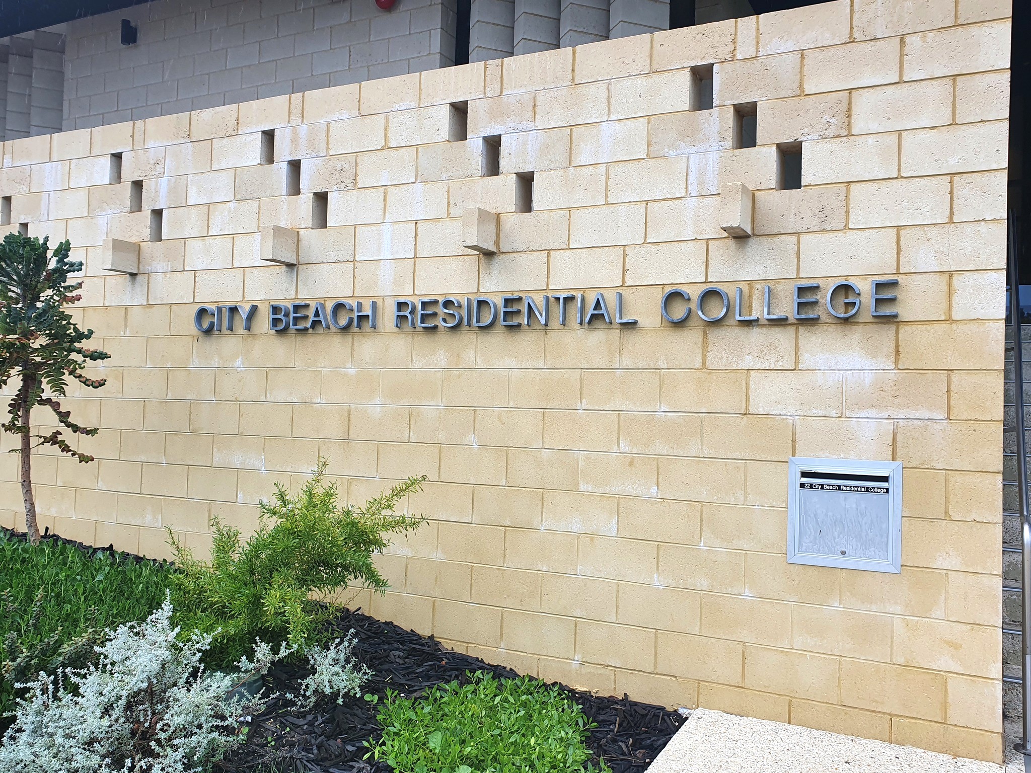 City Beach Residential College sign at front of building