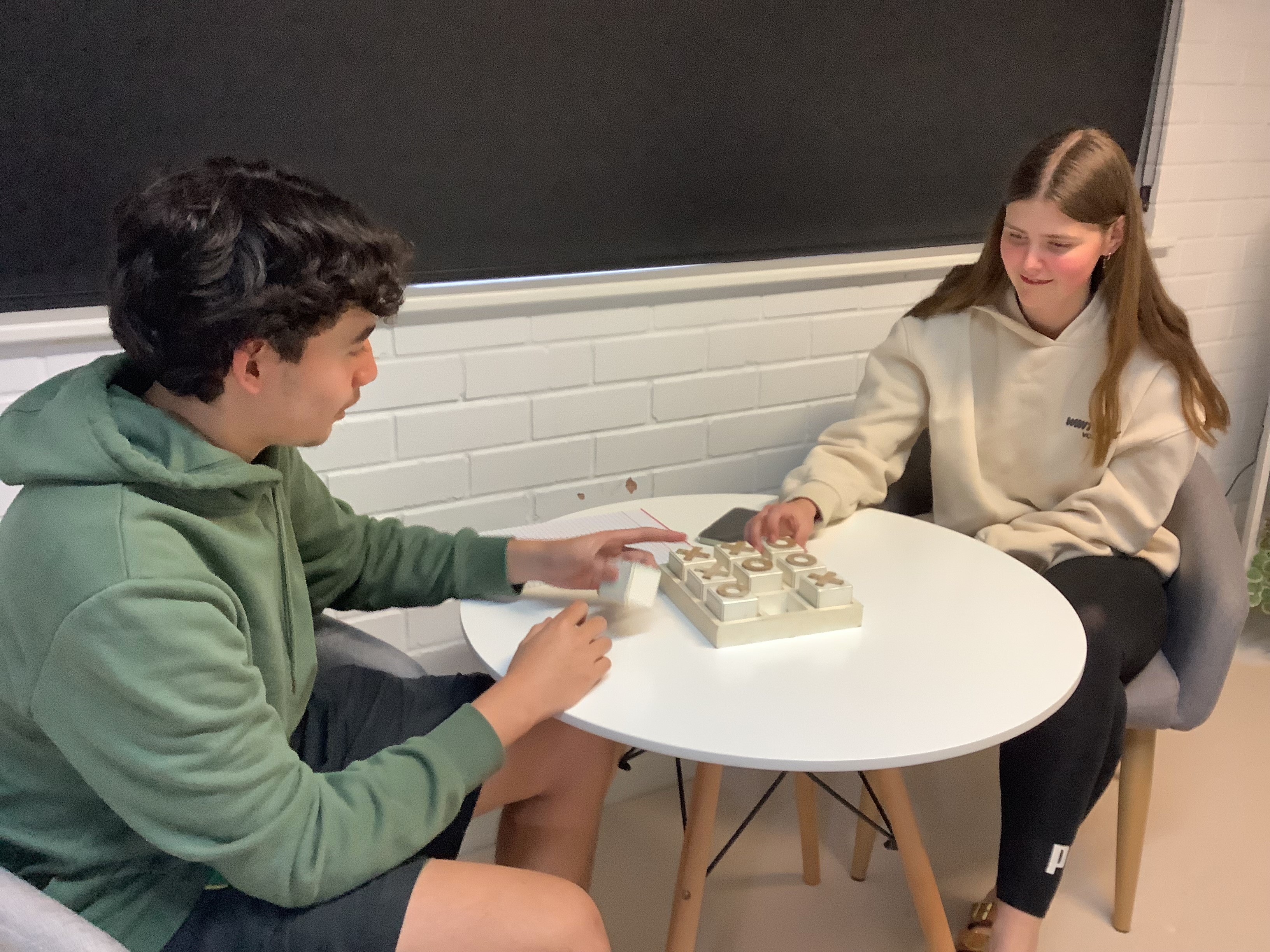 Boarders playing noughts and crosses