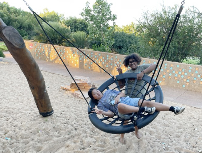 Broome Residential College boarders on the swing at the local park