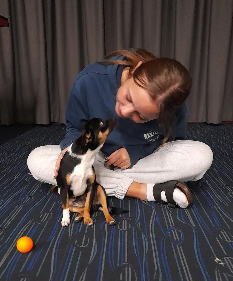 Northam Residential College boarder with a visiting puppy