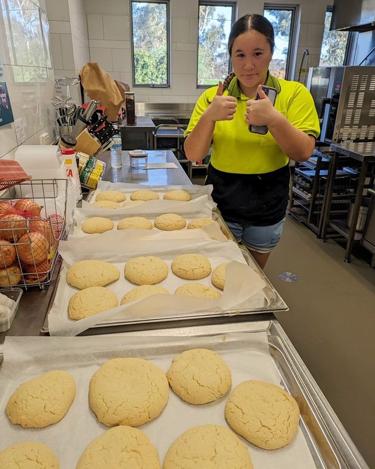 Moora Residential College boarder with a freshly baked batch of cookies