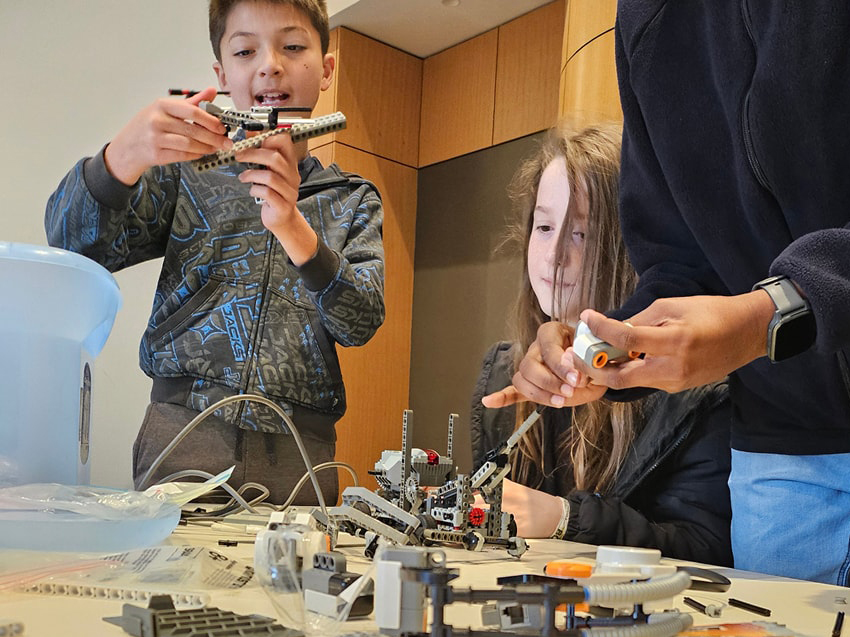 City Beach Residential College boarders enjoying lego technics during rec time