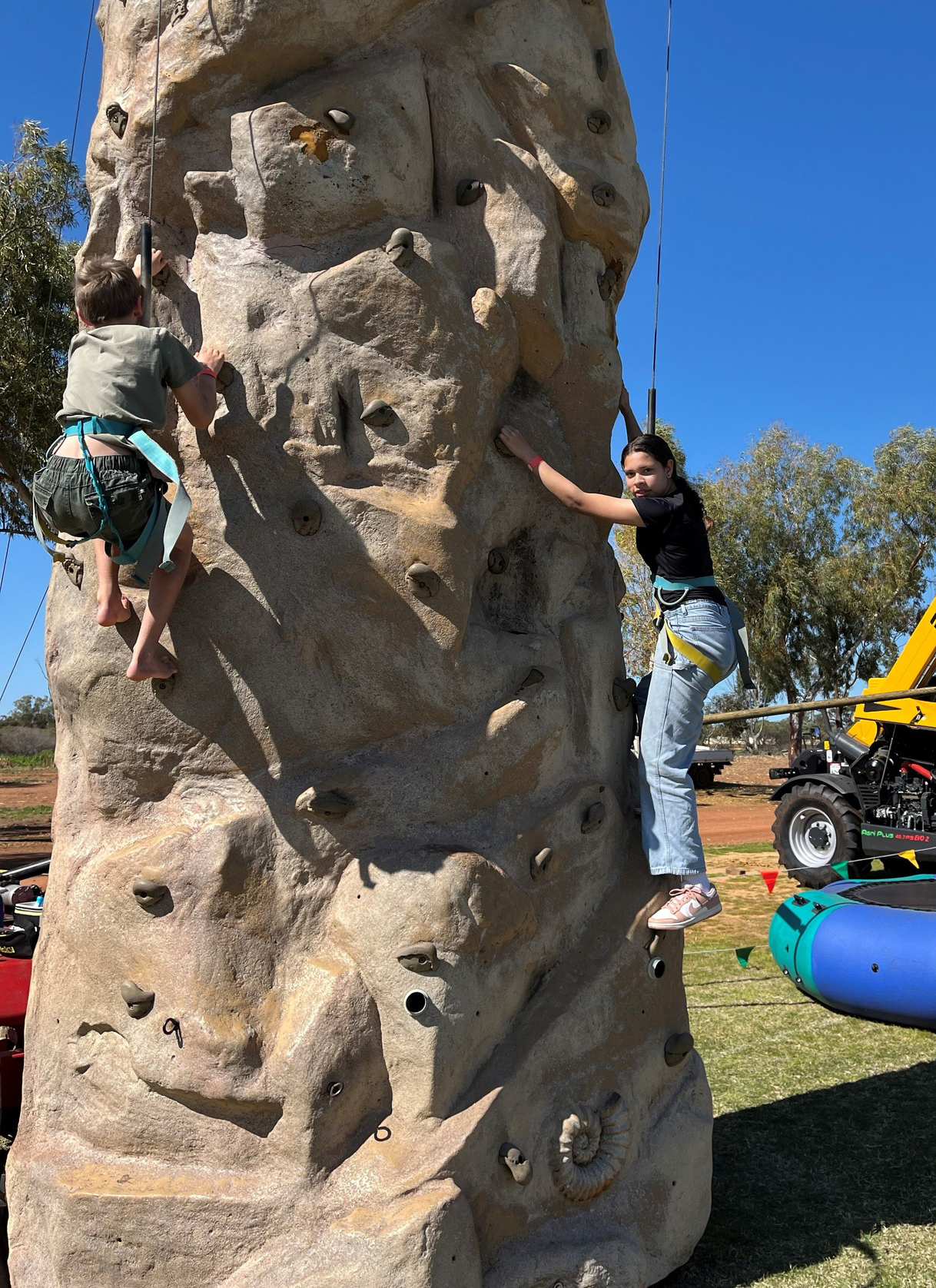 Geraldton Residential College boarders enjoying a rock-climbing activity at the local show.