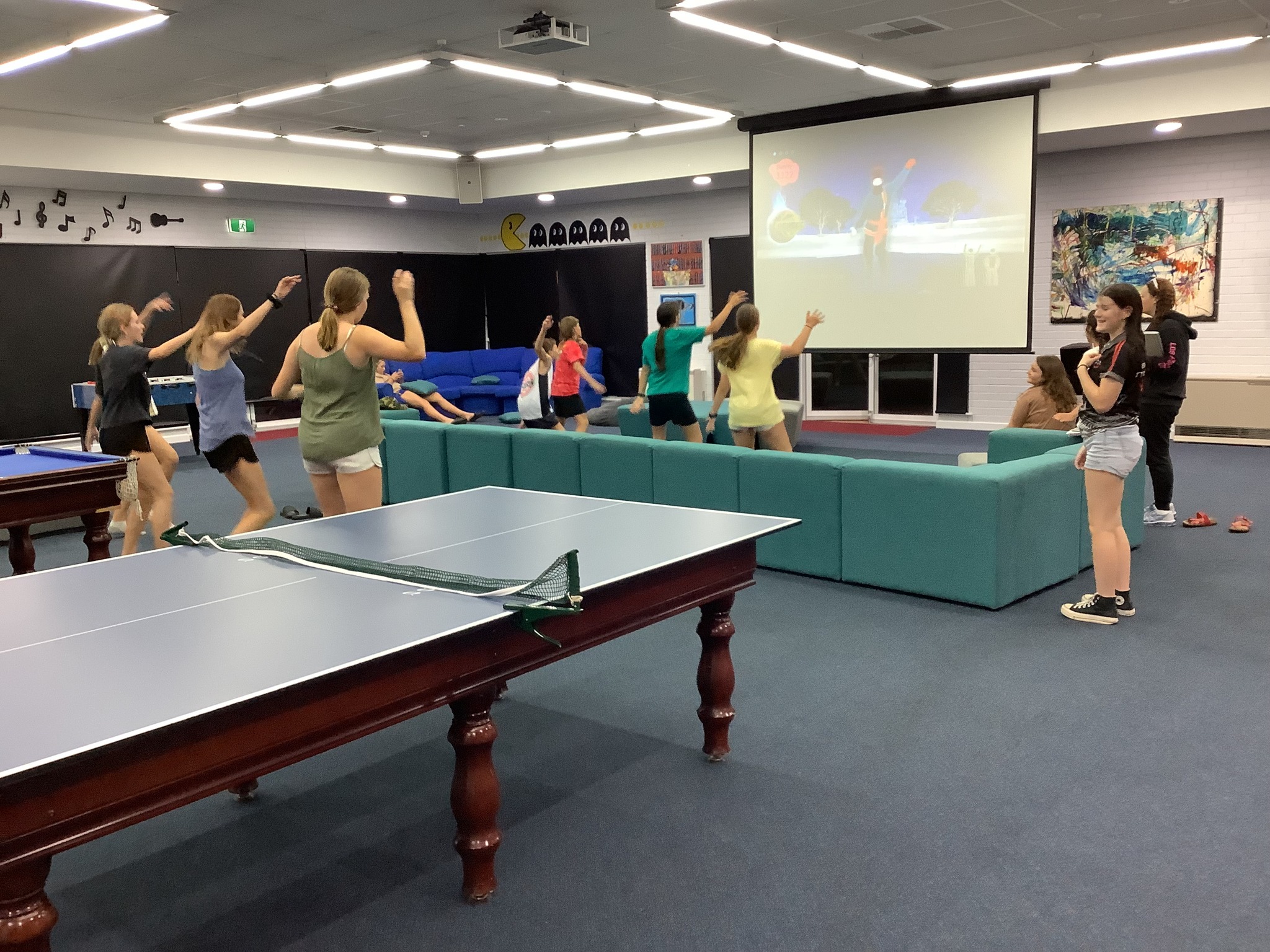 Boarders enjoying a 'Just Dance' game in the large common area at Narrogin Residential College 