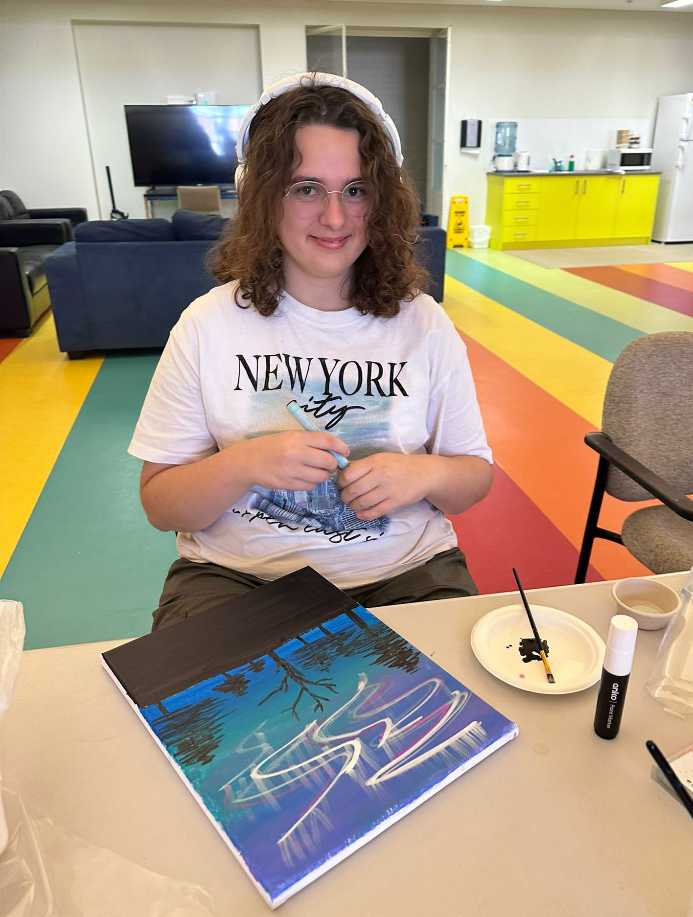 Geraldton Residential College boarder with her painting of the Aurora Australis
