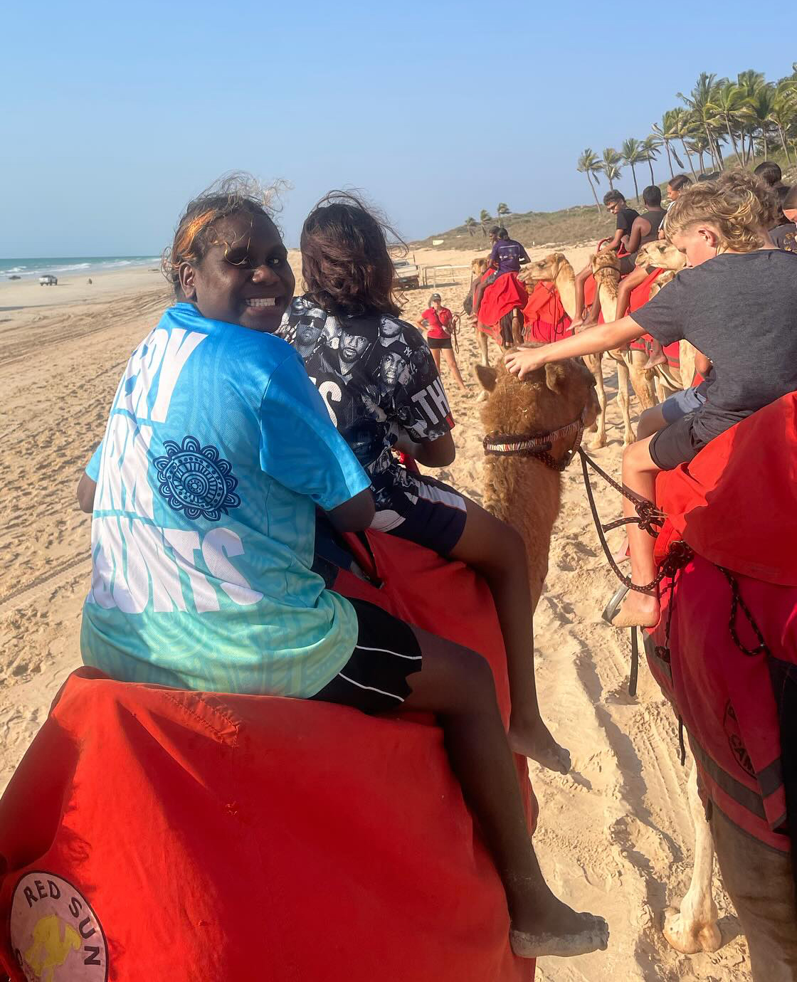 Broome Residential College boarders on a camel-ride excursion at Cable Beach