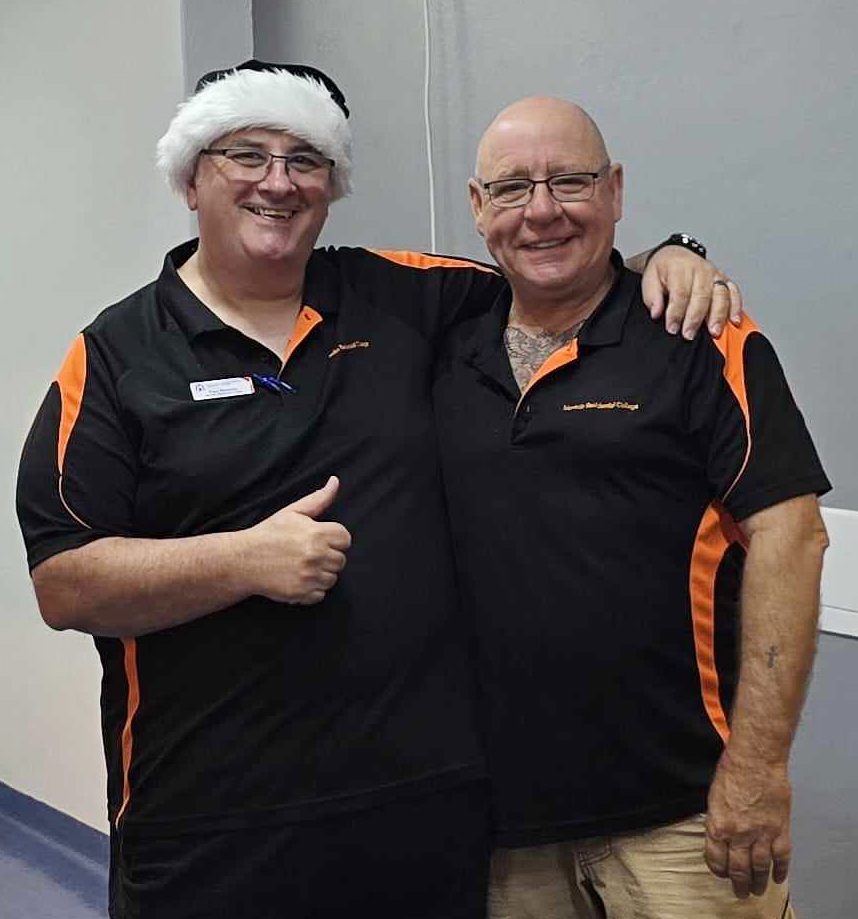 2 boarding supervisors from Merredin Residential College standing arm in arm.