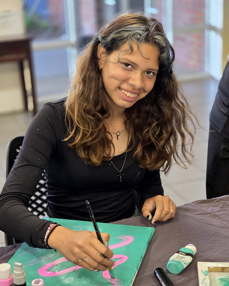 Girl painting at Geraldton Residential College