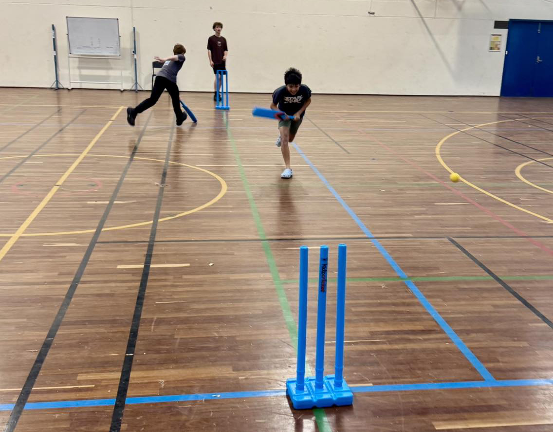 Boarders from City Beach Residential College playing indoor cricket