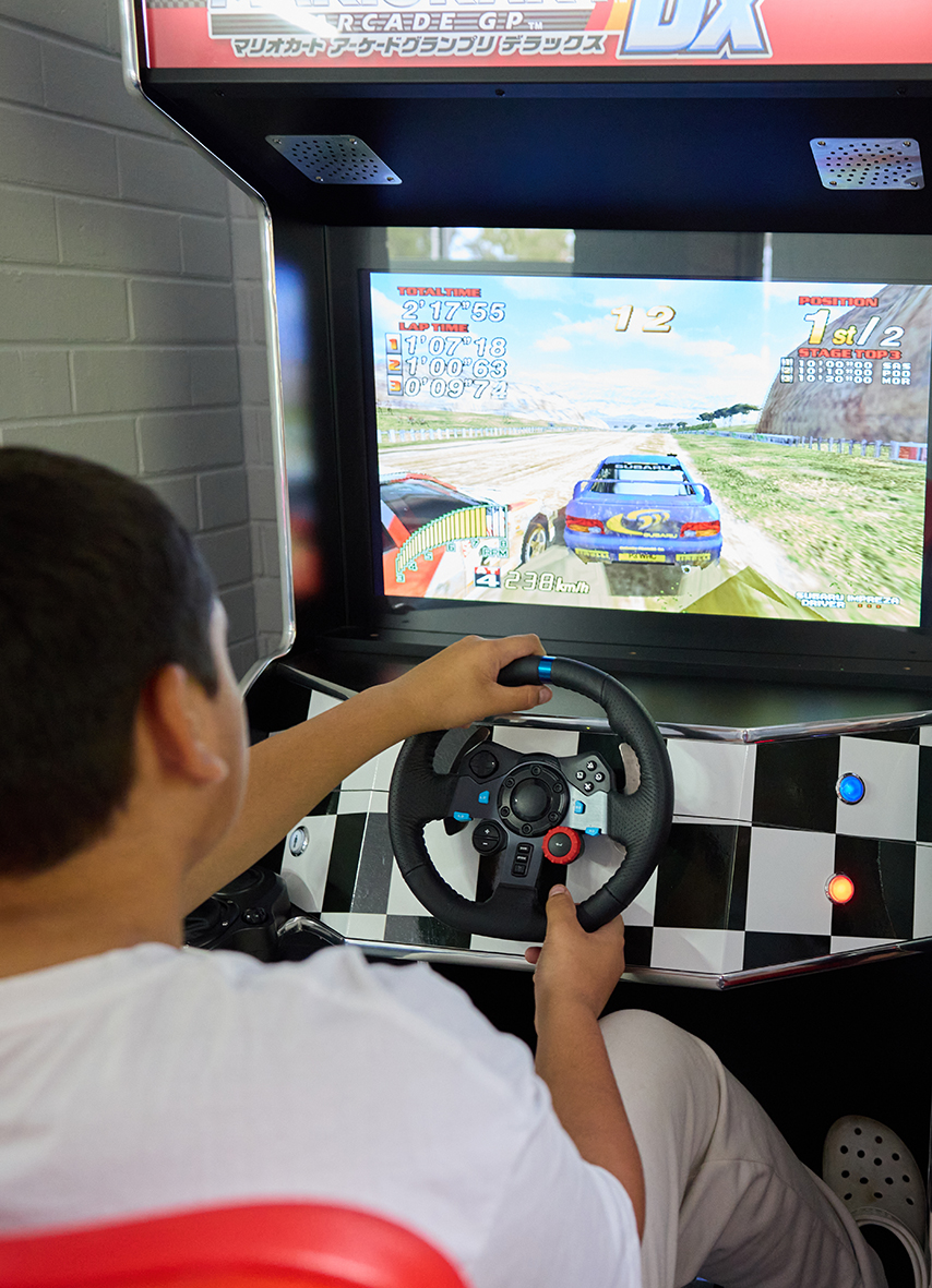 Boarders can enjoy a driving arcade game in the common room at Northam Residential College