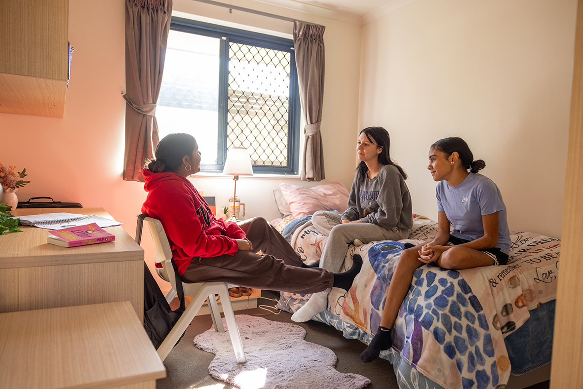 Girls sitting in a typical bedroom at Esperance Residential College