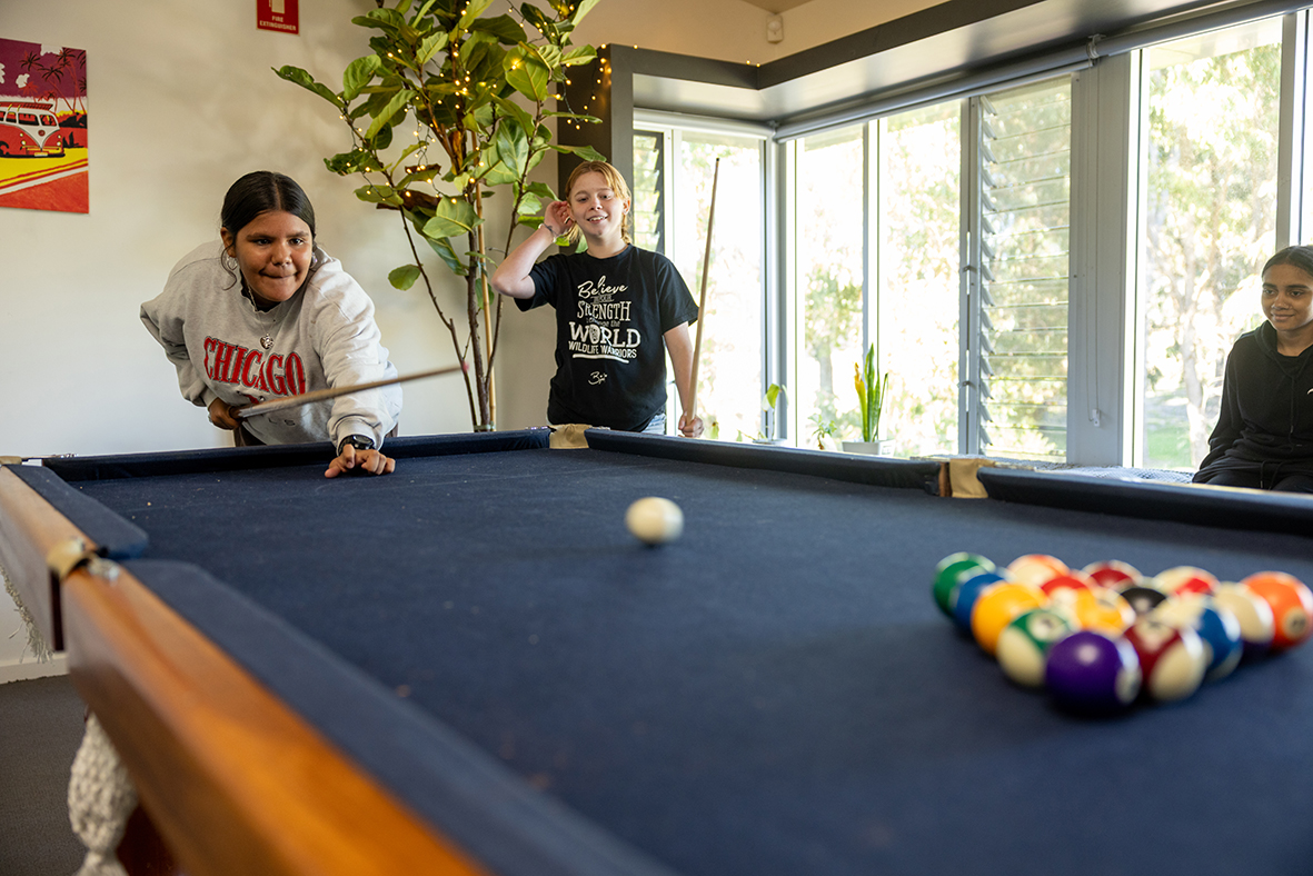 Boarders from Esperance Residential College enjoy playing pool on the college table