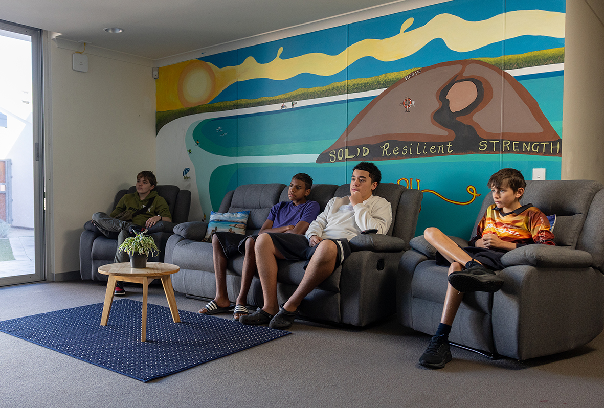 Esperance Residential College boarders sitting, watching tv in the boys' lounge