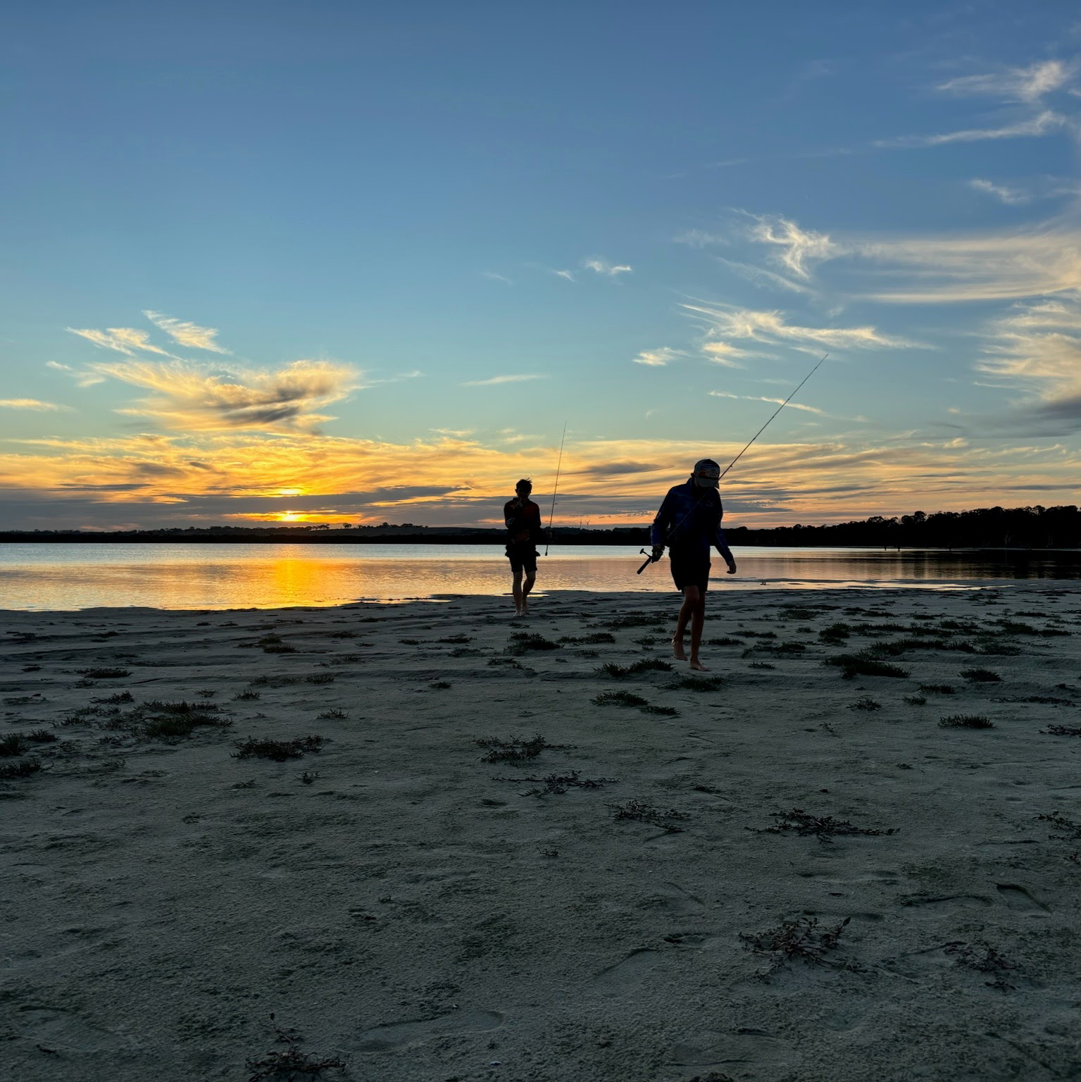 Esperance Residential College boarders fishing on the lake at sunset