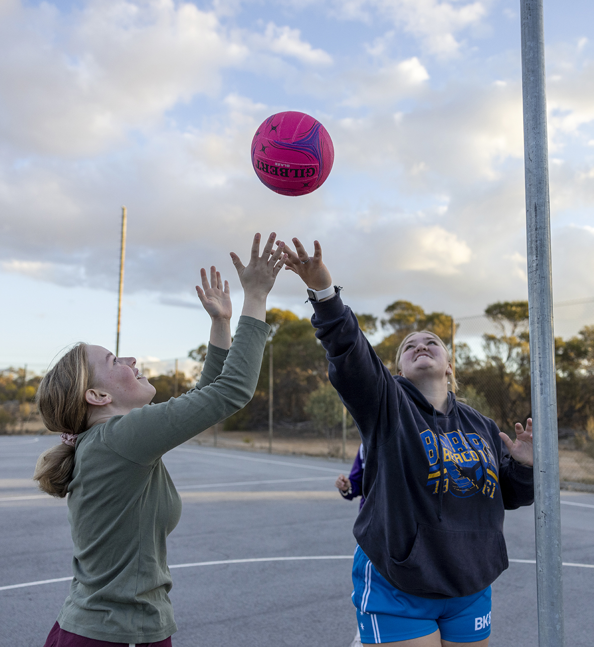 Merredin Residential College boarders playing netball on the college courts.