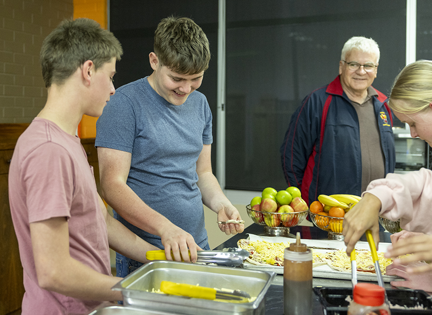 Boarders at Narrogin Residential College making pizza for dinner.