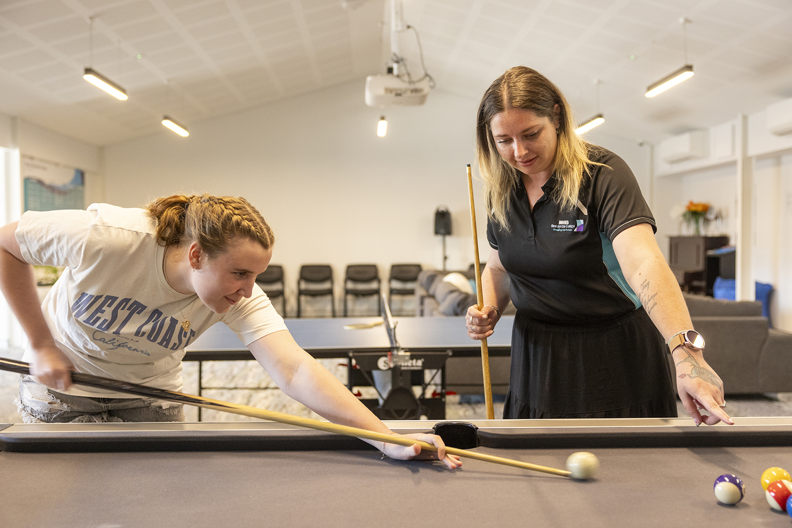 Playing pool on the Moora Residential College pool table.