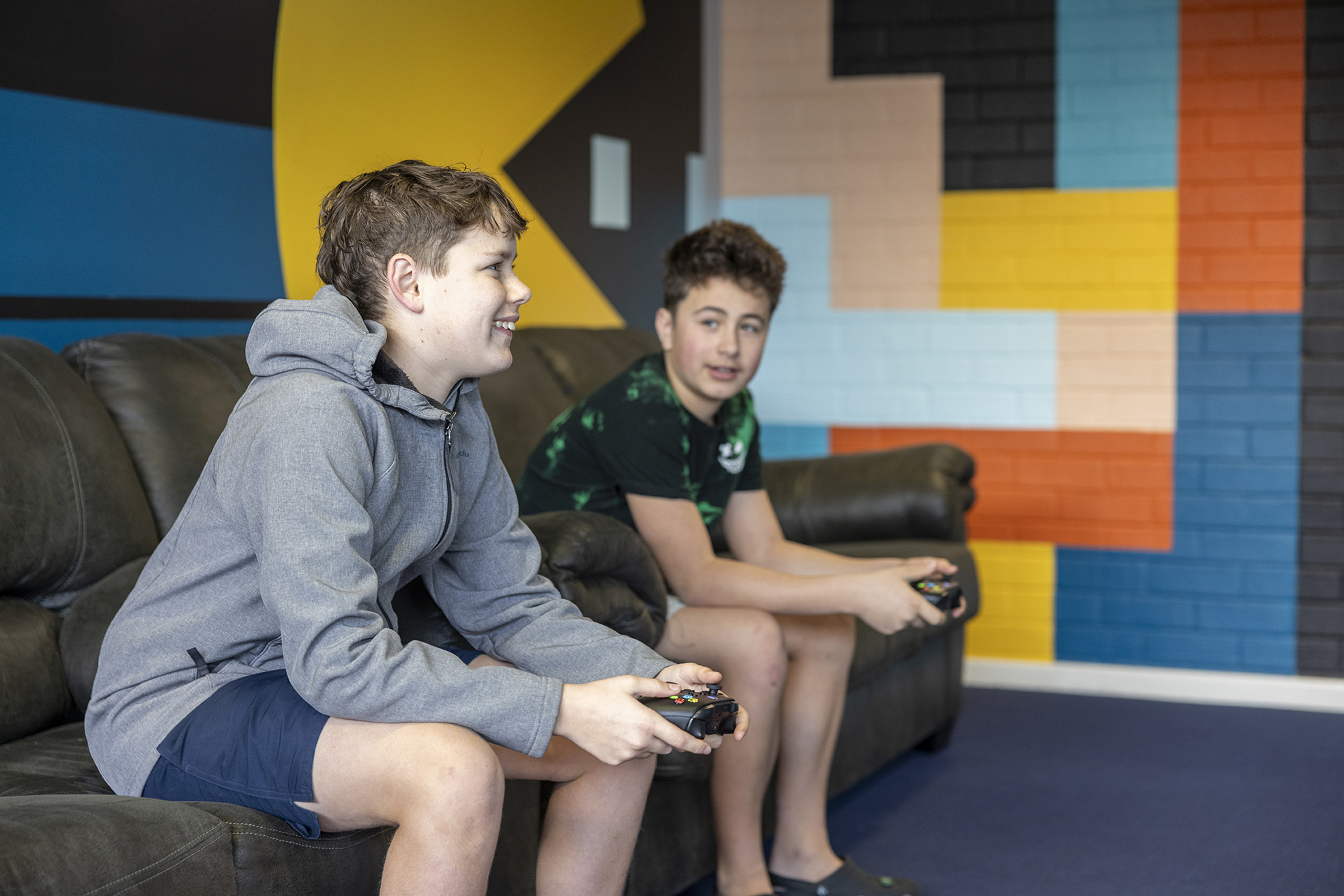 Albany Residential College boarders playing on the xbox in the common room.