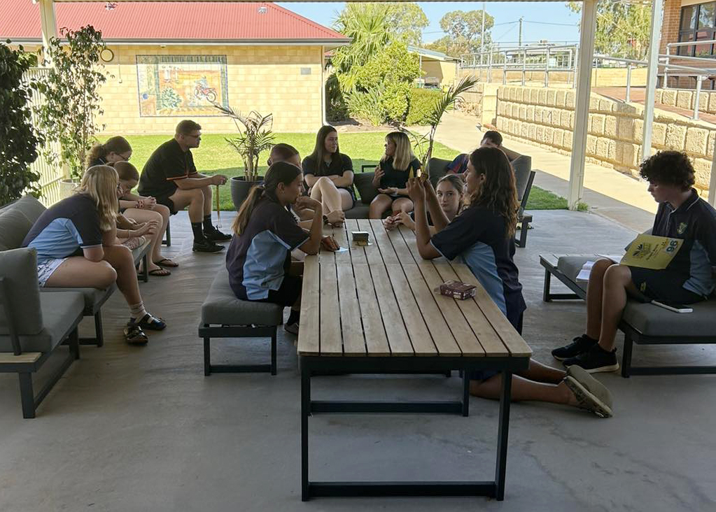 Tech-free Tuesday time is spent with boarders playing cards and chatting all together at Merredin Residential College