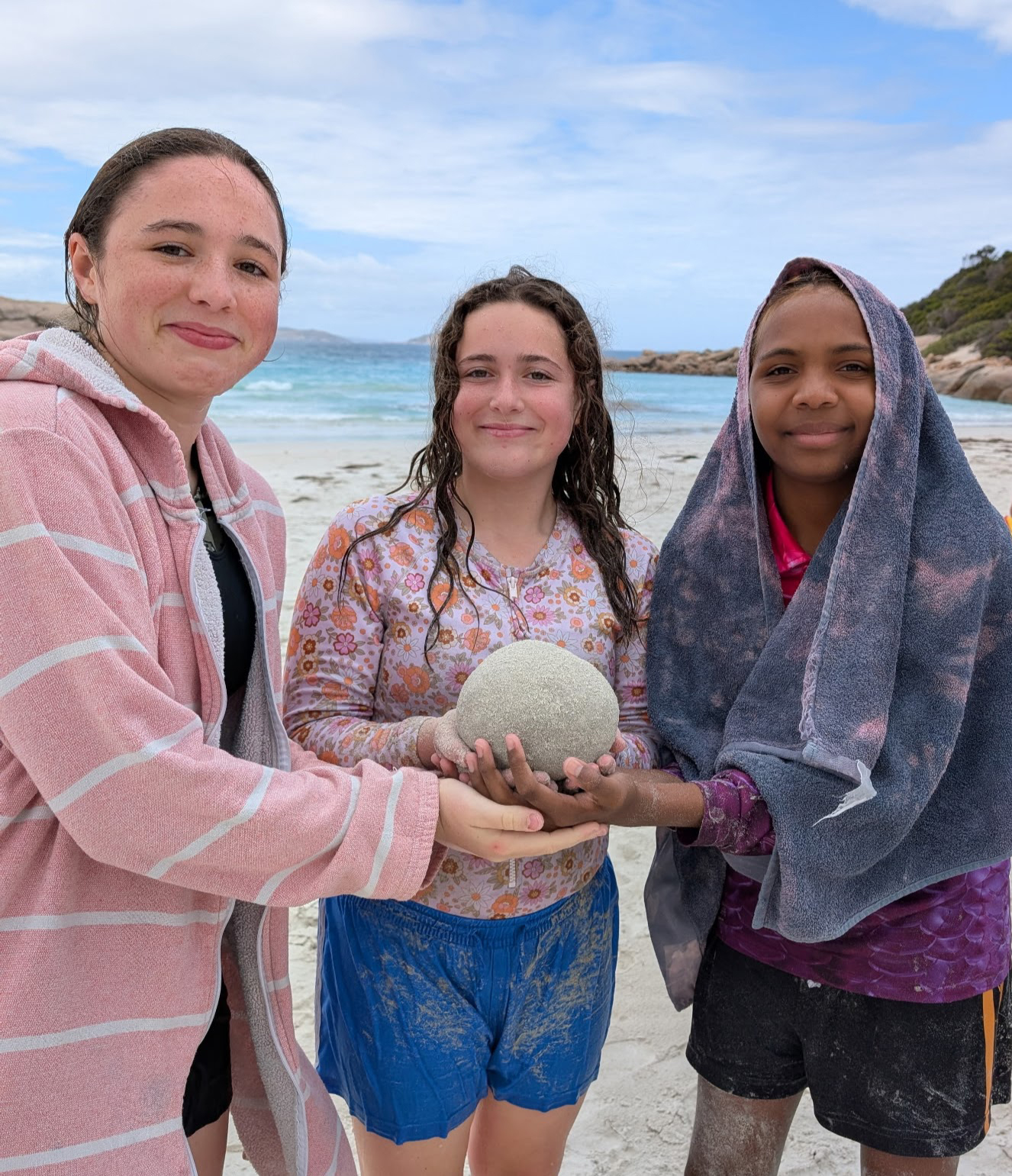 Espernce Residential College boarders proudly showing off their giant sandball.