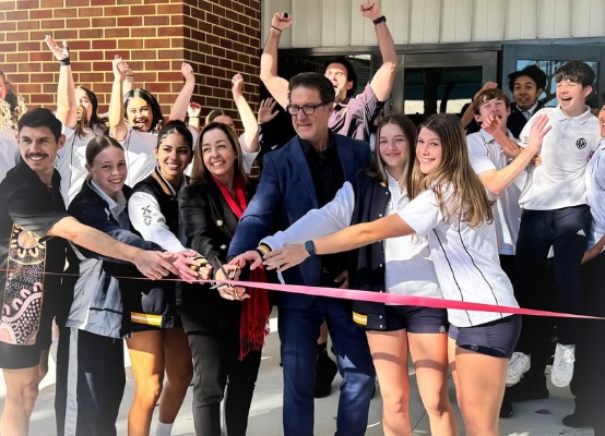 Kelmscott SHS students, staff and principal cutting the ribbon for the new facility