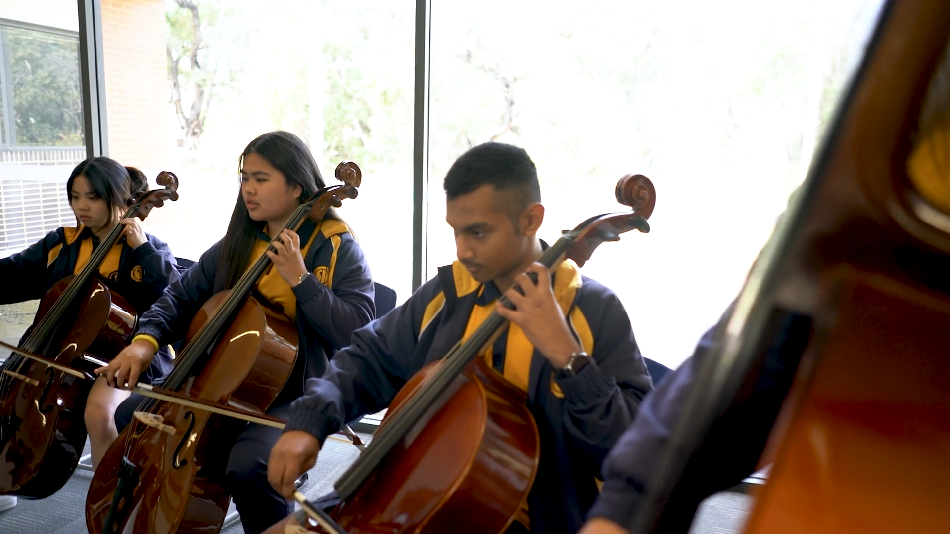 Kelmscott SHS students playing cello in the new music room