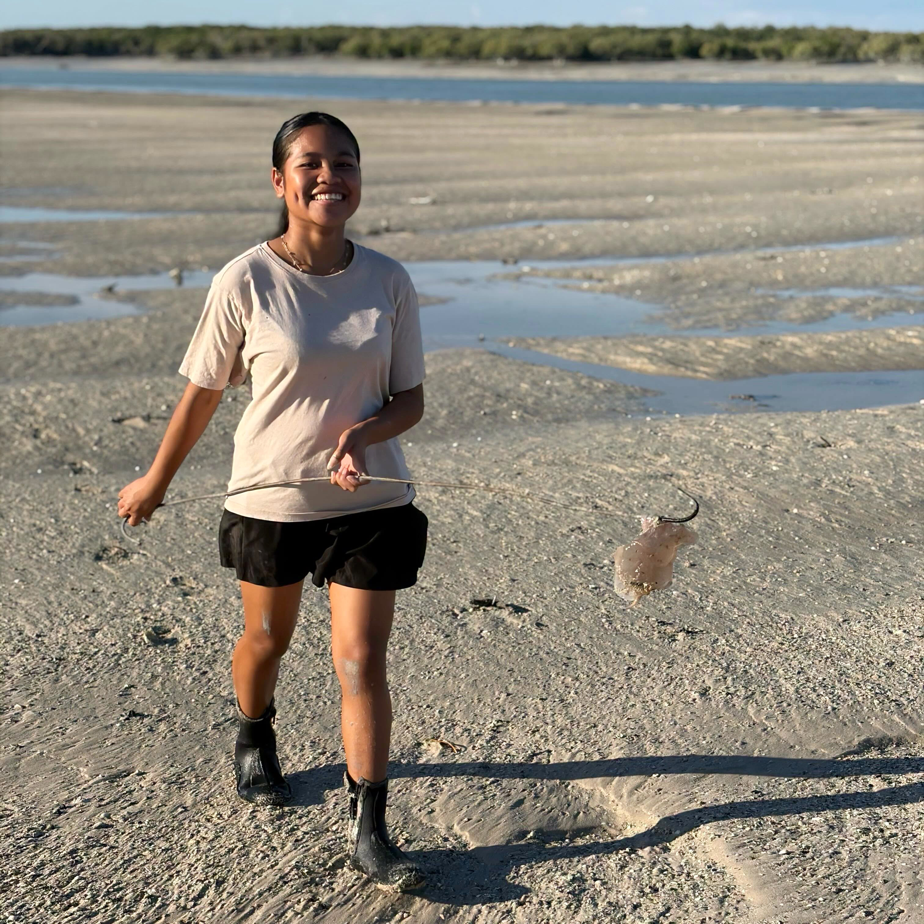 Broome Residential College boarder crabbing in the mangroves