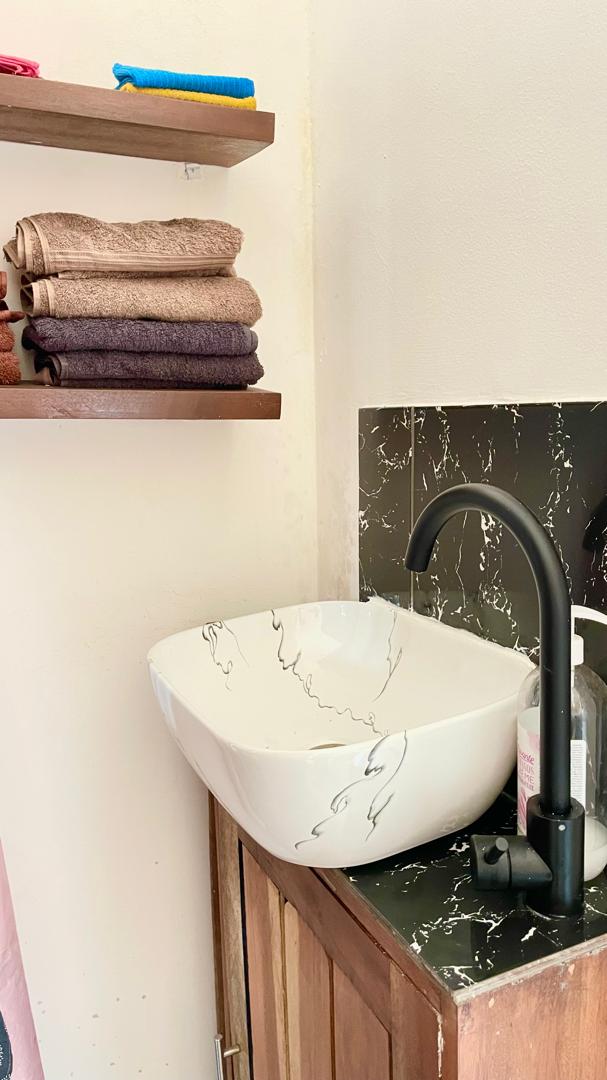 Espace lavabo et linge de soin
