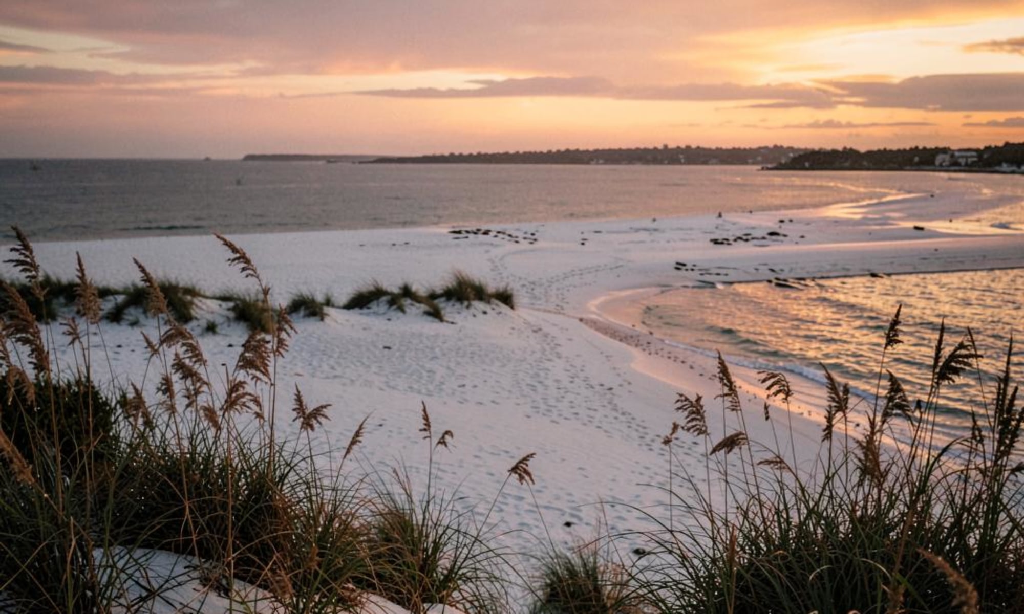 Bean Point beach at the northern tip of Anna Maria Island with white sand dunes at sunset