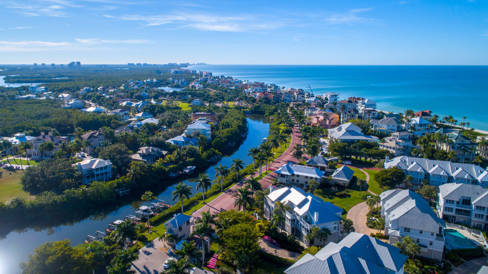 Canal-front homes and the Gulf from the air