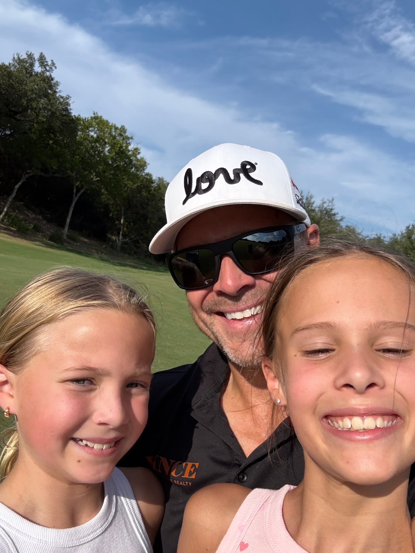Rick with both daughters on the Westlake CC course