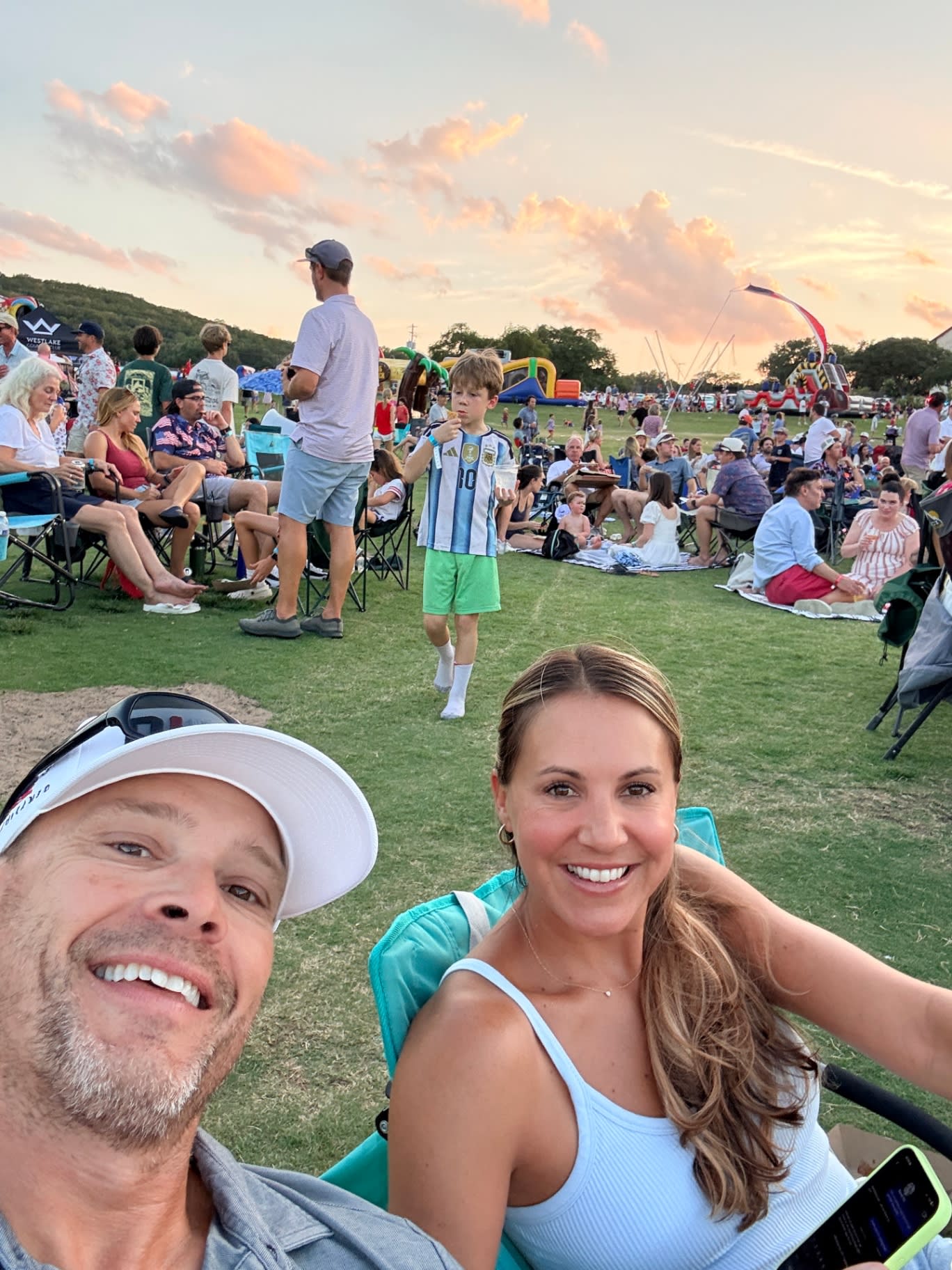 Members at the Westlake Country Club July 4th party on the range at sunset
