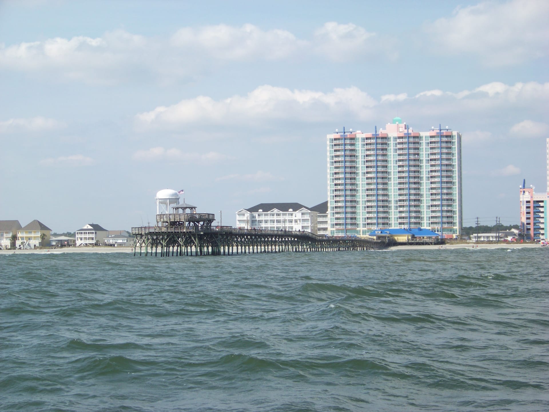 The Cherry Grove Fishing Pier in North Myrtle Beach, SC, seen from the water