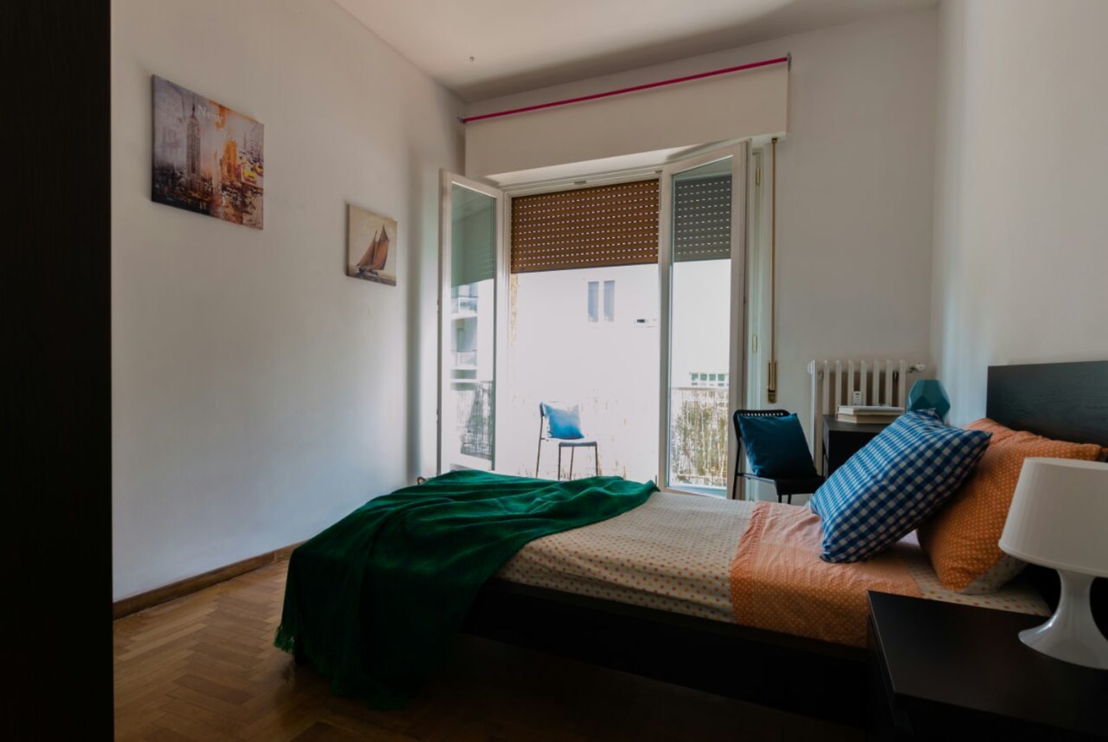Stanza 1.3 — Singola con balcone privato