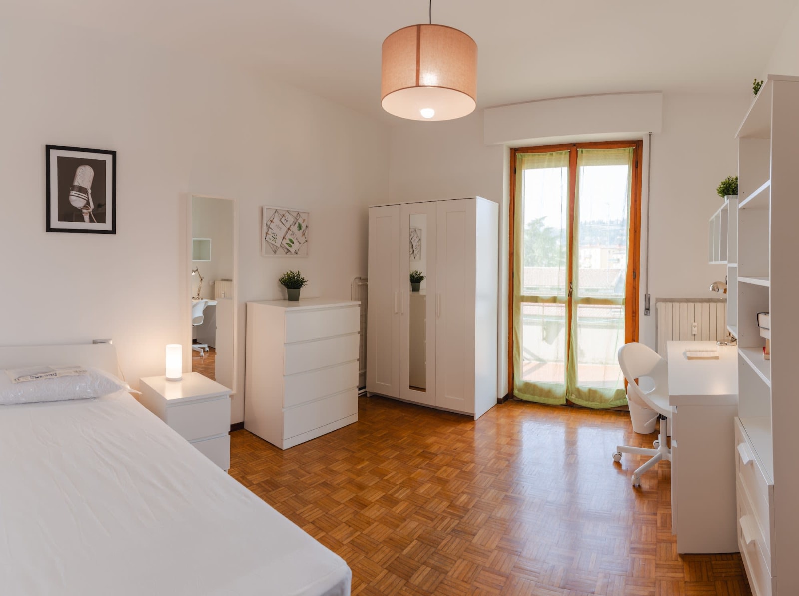 Stanza 24.3 — Singola con balcone