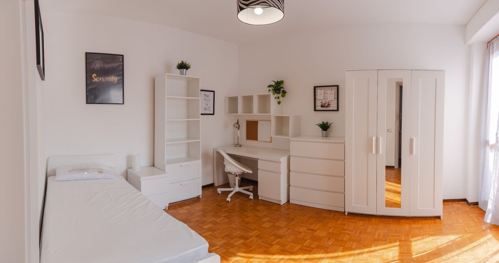 Stanza 24.5 — Singola con balcone privato