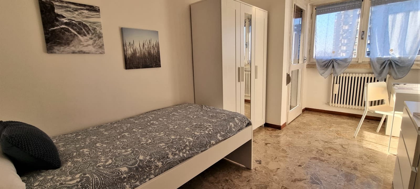 Stanza 15.2 — Singola con balcone