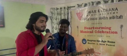 A performer leads the special musical program at the Heartwarming Musical Celebration