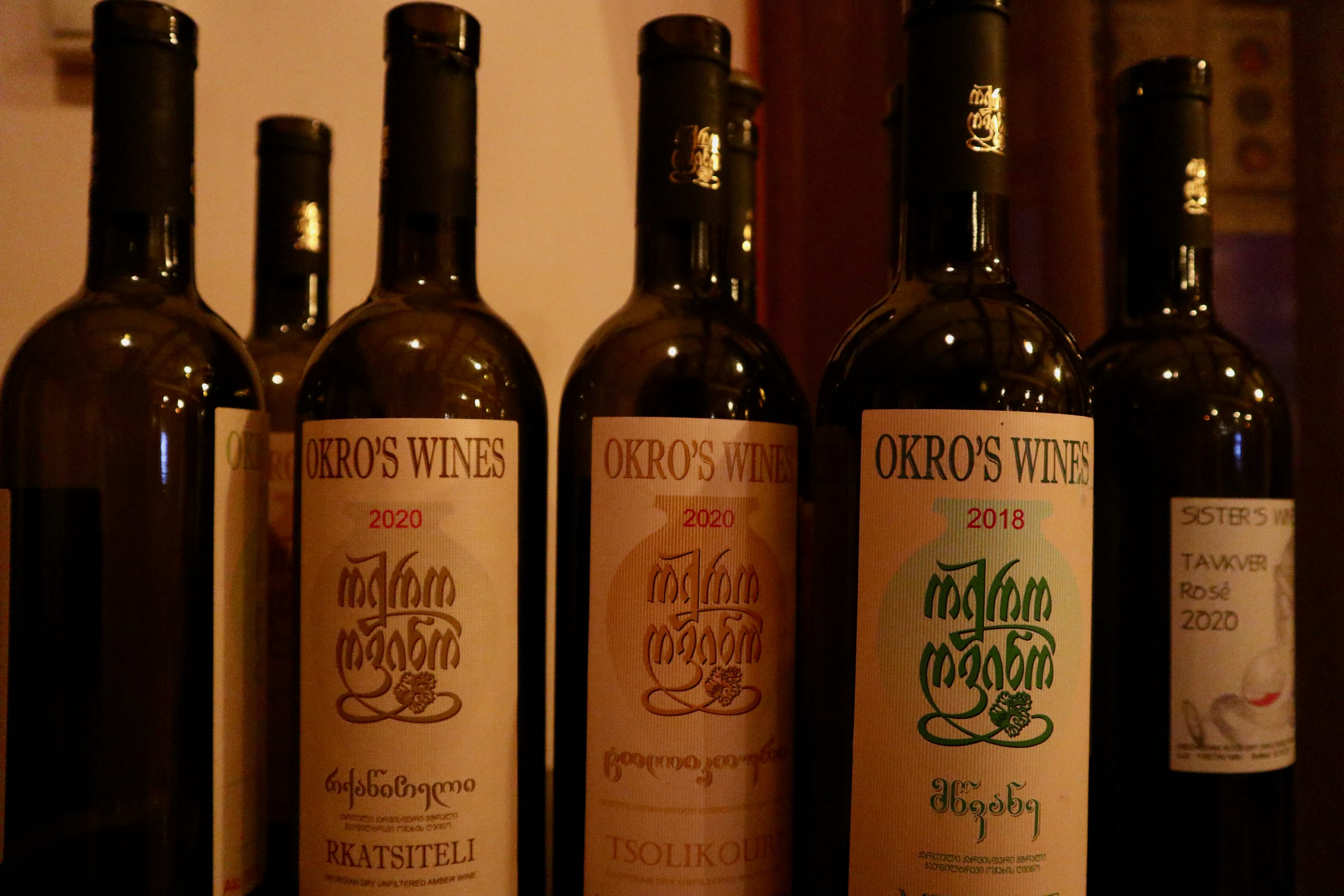 Explore a romantic selection of wine bottles from Okro's Wines in Sighnaghi, featuring various vintages and labels, including Rkatsiteli, Tsolikouri, and Saperavi. Perfect for those seeking enchanting activities in Georgia's renowned winemaking region. While visiting this picturesque town, there are several things to do in Sighnaghi to enhance your experience. Wander through its cobblestone streets and admire the stunning views of the Alazani Valley, explore the historic city walls offering panoramic vistas, or enjoy a cozy meal at one of the local inns. The combination of beautiful scenery and premium wines makes Sighnaghi an ideal destination for romance and relaxation amidst Georgia’s celebrated wine country.