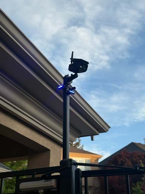 Security camera mounted on building exterior