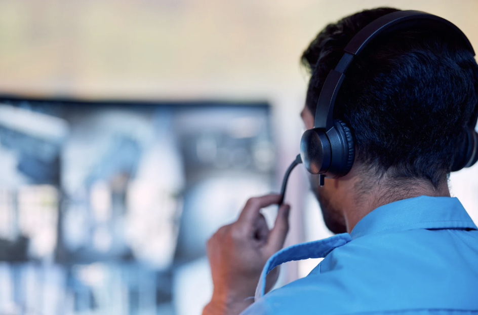 Security camera mounted on building exterior