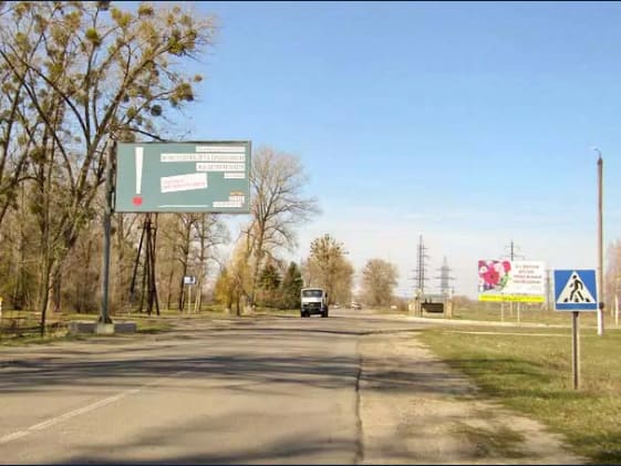 Траса - Слобожанське,Балакліївське шосе-в'їзд, навпроти зупинки