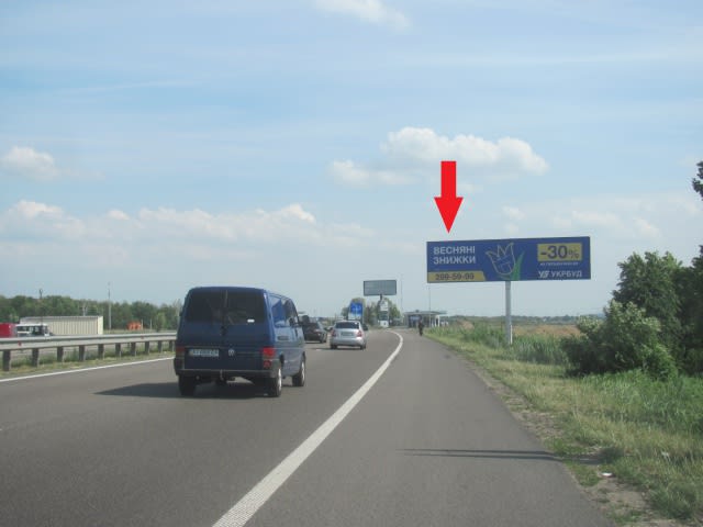 Київ - Новообухівська траса (Дніпровське шосе), в напрямку з м. Київ, 300 м.. після ТЦ"Мегамаркет", "Мануфактура" ,600 м. ЖК Нова Конча Заспа,  лівий