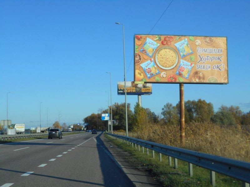 Глеваха - траса М-05 Київ-Одеса, км 27+100 ліво, через 460м після АЗС Укрнафта та через 90м після автобусної зупинки, за 610м до розв'язки на м. Васильків