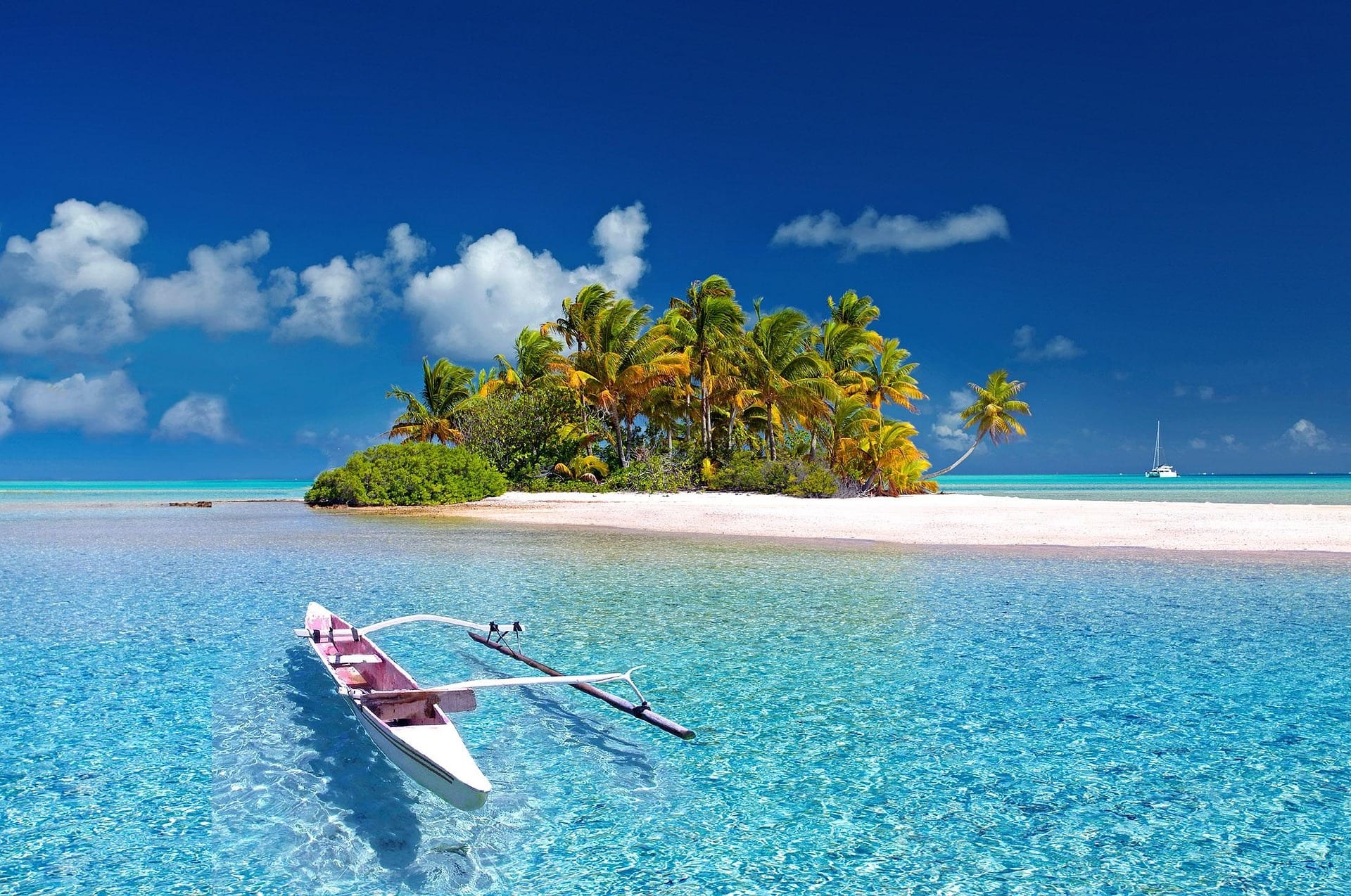 boat and small island in Tahiti