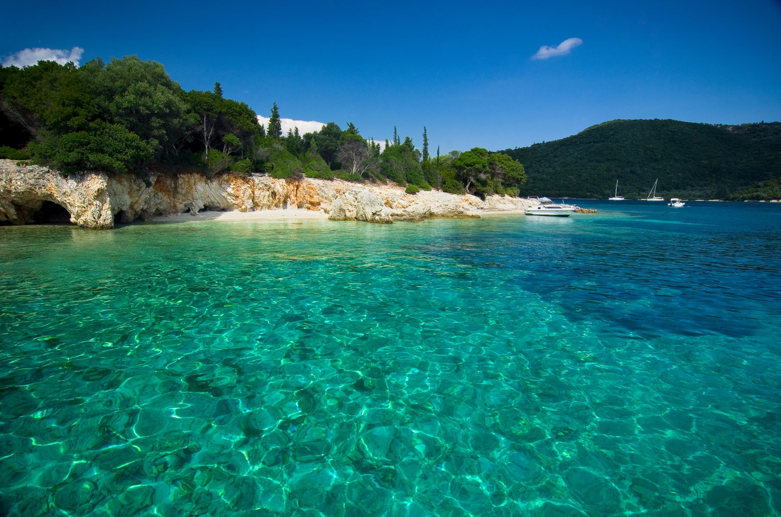 Meganisi island. Meganisi is a Greek island located to the east-southeast of the island of Lefkada and is easily reached by a short boat ride from Nydri.
