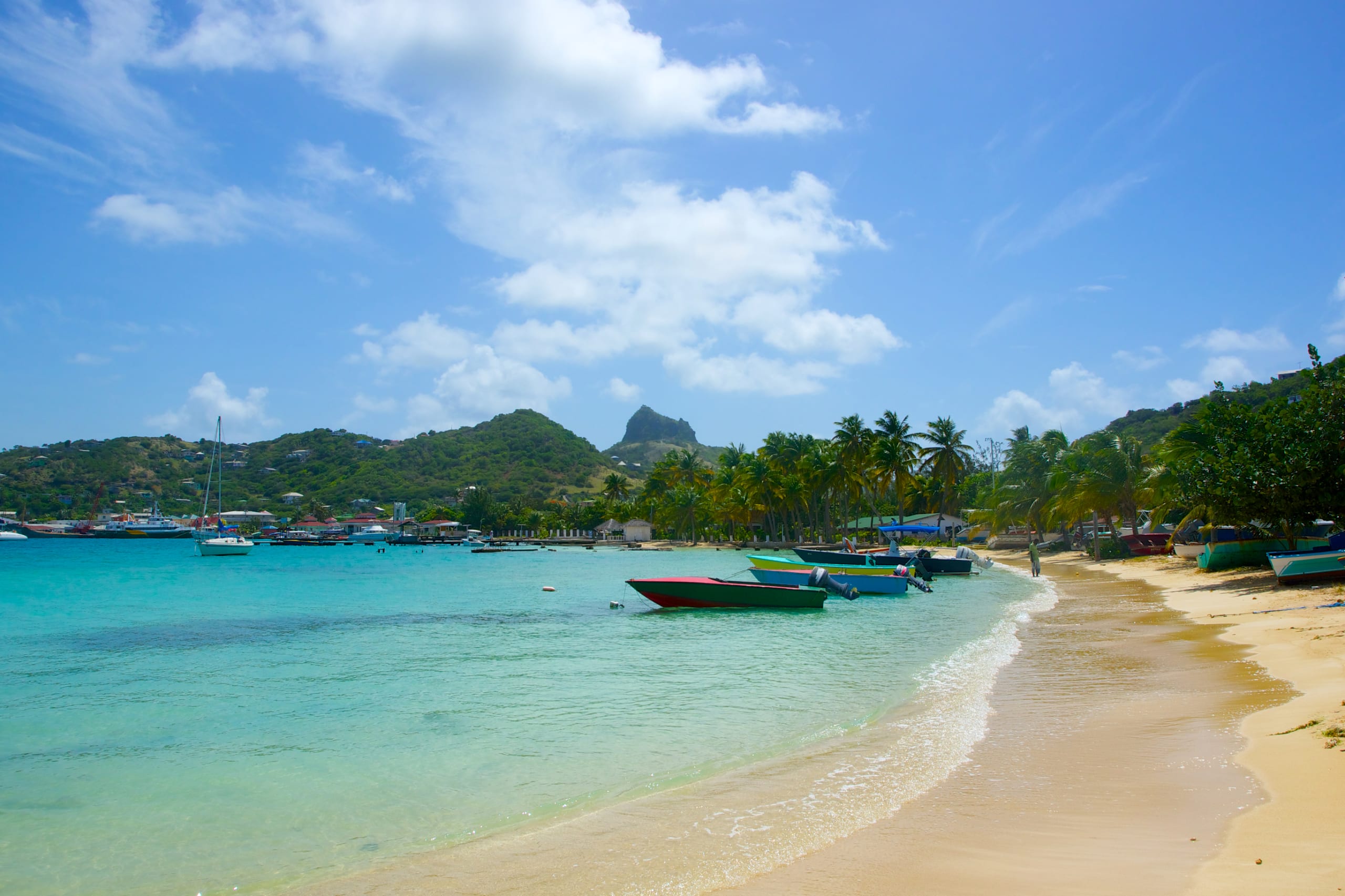 Shoreline of Union Island. Boats in a row await their owners in the bay of Union Island.