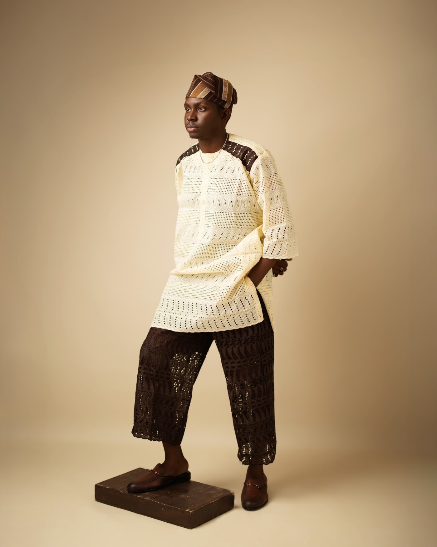Oluwafemi Oduneye in Yorùbá attire and fila