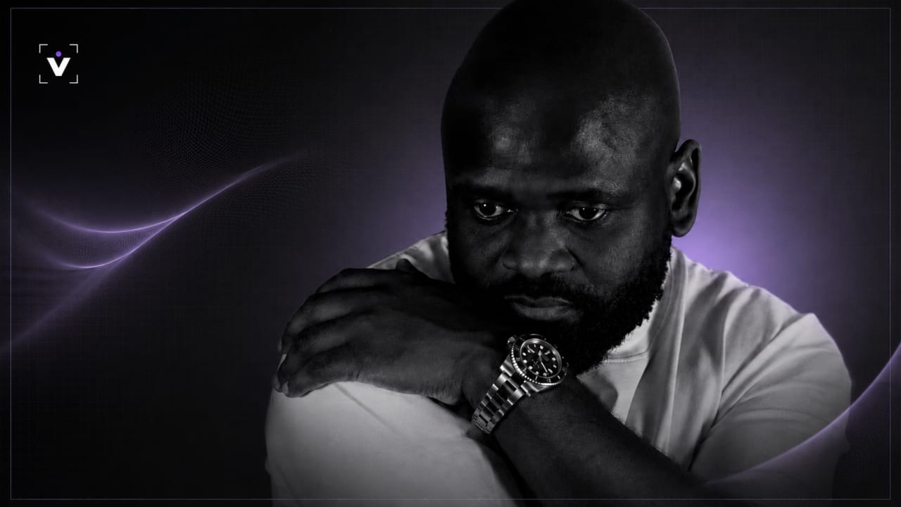 Editorial visual representing Credo V Daniels and South African music’s AI-authenticity debate, featuring a studio microphone, human vocal waveforms, digital processing grids, piano textures and premium Viranova purple-blue glass styling.